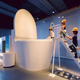 Illustration for article titled Japanese Children Climb into a Giant Toilet for Science